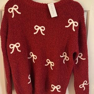 Chic Red Sweater with White Bow Details